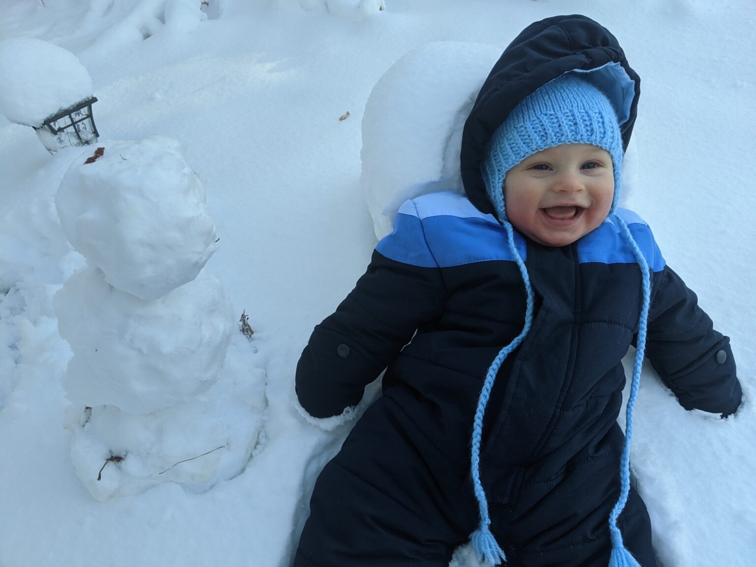 Baby’s first snow day! – Justin and Courtney